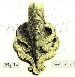 A head at the base of the handle of the Waldalgesheim flagon, Rheinisches Landesmuseum Bonn.: 79 