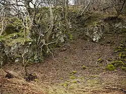 Small disused quarry in the andesite at the base of Great Mell Fell