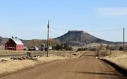 East Noe Road in Greenland, with Larkspur Butte in the distance.
