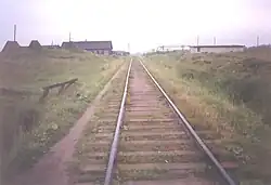 Train tracks leading into area.