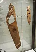 Russia. Left, 9-string gusli, 13th century. Right, 4-string gusli, 14th century.