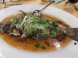Scallion on steamed fish