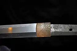 It is first inserted on the blade.