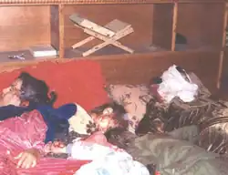 The huddled bloody bodies of Ayda Yassin Ahmed (44) and her children Sabaa (10), Ayesha (3), Zainab (5) and Mohammed (8) lying on the bed where they were shot and killed.