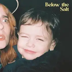 Photograph of a toddler smiling with half of Blais's face to the left looking up in concern.