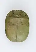 Heart scarab of the singer of Amun Iakai; 1550–1186&nbsp;BC; glass; length: 4.8&nbsp;cm, width: 3.5&nbsp;cm, height: 1.5&nbsp;cm; Metropolitan Museum of Art (New York City)