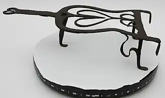 Heart trivet with three legs