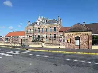 The town hall and schools of Helfaut