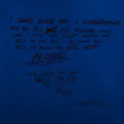 A handwritten message in dark text on a blue background. The message reads: "I could never say I understand how you all are feeling, nor can I find the right words to say to you, but I do want you all to know, you are not alone. The words at the end of this song are dedicated to you, Douglas High. Sincerely, XXX."