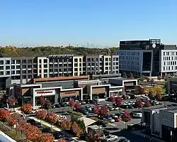 The Shoppes at Vermella and Hynes Hall with Newark International Airport and the New York City skyline in the background
