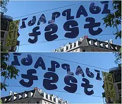 A practical application of mirror ambigrams in a banner reading "Idaplatz fest" front and back (Zürich, 2008).