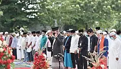 Muslims, wearing face masks gather for the Eid al Adha prayer in Indonesia.