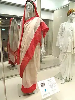 Image 42Red and cream Indian woman's saree, late 1990s (from 1990s in fashion)