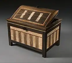 Inlaid box for cosmetic vessels of Sithathoryunet; 1887–1813 BC; ebony, inlaid with ivory and red wood (restored) and gold trim; height: 25.2&nbsp;cm, length: 36.4&nbsp;cm, depth: 25.2&nbsp;cm; Metropolitan Museum of Art