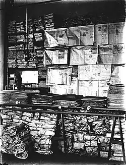 Interior of Ferry Museum showing shelves with papers and newspapers, Tacoma, Washington, ca 1911