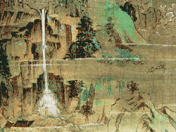 White waterfall in the middle of the rocks.