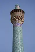 Banna'i on the minaret of Isfahan's Shah Mosque – a repetitive pattern of square Kufic inscriptions