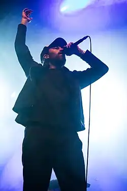 J. Bernardt performing in 2017