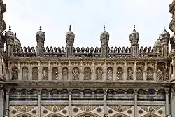 Stucco work on the facade of the Toli Masjid