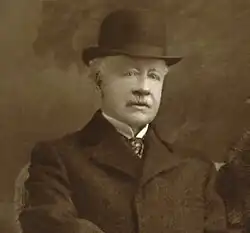 A portrait photograph of James F. Quigley