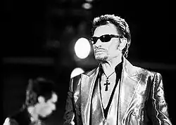 Hallyday performing in Villeneuve-d'Ascq in 2003