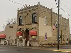 Modest Victorian brick building housing a cafe"