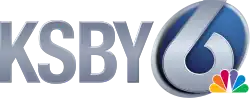 Silver letters K S B Y next to a blue oval with silver trim containing a numeral 6 with open top, the top of which extends beyond the oval. The NBC peacock sits over the lower right of the oval and 6.