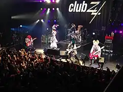 Kiryu in a show in Japan presented by Club Zy magazine.