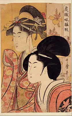 A colour print of a close-up of the head and upper torso of a finely dressed Japanese woman. Behind her is a bamboo screen on which is depicted a similar woman's head and upper torso.
