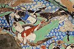 Apsara flying with 5-string pipa, Kizil Cave 8, 6th century