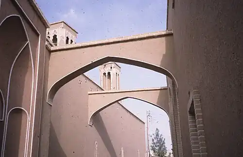 The high walls of the Koocheh provided relief from dust storms and intense sunlight. This was an efficient and ancient form of urban design in Iran.