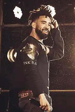 Kyle performing in 2024