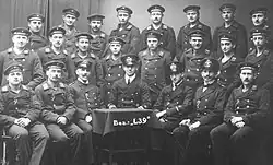 B&W photo of men in uniform