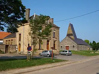 The town hall and church in La Neuville-à-Maire