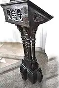The Lectern of St. Mary's Church is richly carved in wood.