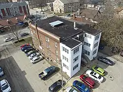 An aerial view of the existing 3-story apartment building renovated by Illinois Solar Decathlon as part of the 2016 Race to Zero project.