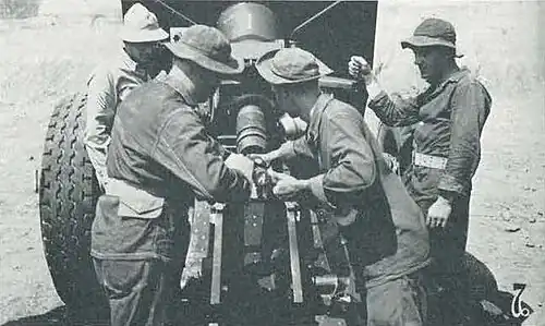 A M114 155 mm howitzer is loaded during training at Fort Leonard Wood, Missouri in 1941