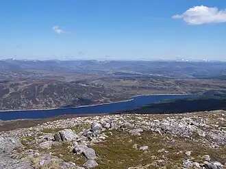 A long lake surrounded by hills