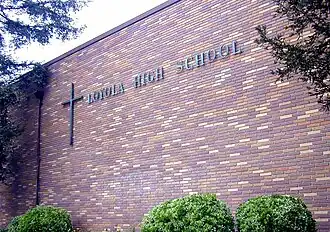 School sign for Loyola High School