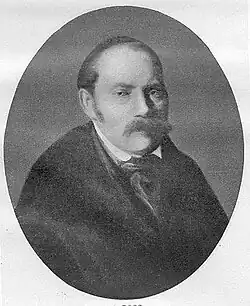 Ross in later life: a hunched figure in black clothes with a large moustache