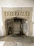 Decorated medieval fireplace