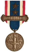 The arms emblazoned onto the reverse side of the Medal for Fidelity to France&nbsp;[fr], instituted in 1922