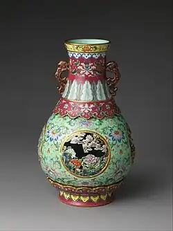 Vase; last quarter 18th century; porcelain with openwork medallions, painted in overglaze famille rose enamels, with engraved design: height: 29.8&nbsp;cm, diameter: 19.1&nbsp;cm; Metropolitan Museum of Art