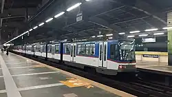 A four-car MRTC 3000 class train at Araneta Center-Cubao station in April 2022