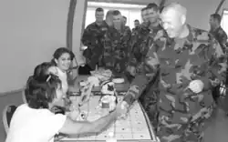 Miss Universe 2002, Justine Pasek, with Miss USA 2002, Shauntay Hinton and Miss Teen USA 2002, Vanessa Semrow at Guantanamo Bay