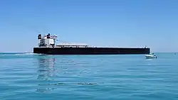 The American Integrity on Lake St. Clair heading to the St. Clair River empty and riding high. Looking at the stern.
