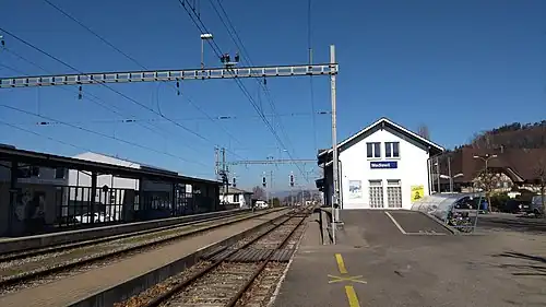 Two-story building with gabled roof