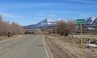 Maher in 2016, with Mount Lamborn in the distance
