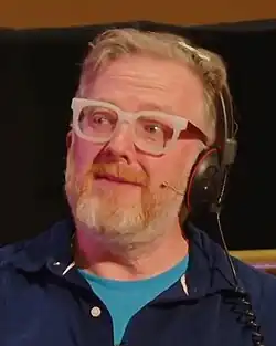 Sweet chairing an event at the British Library, 2022