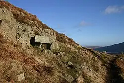 The memorial seat on Gowbarrow Fell. The inscription reads, "A thank-offering 1905"